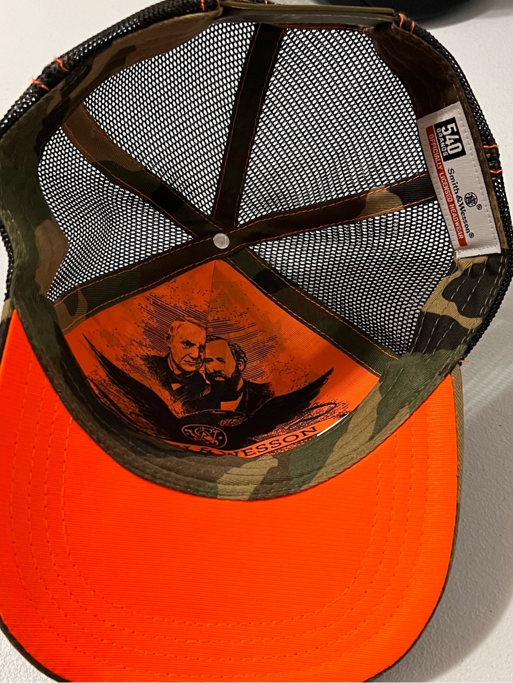 Men's Camo Trucker Hat in Green with Orange Stitching - Picture 3 of 4
